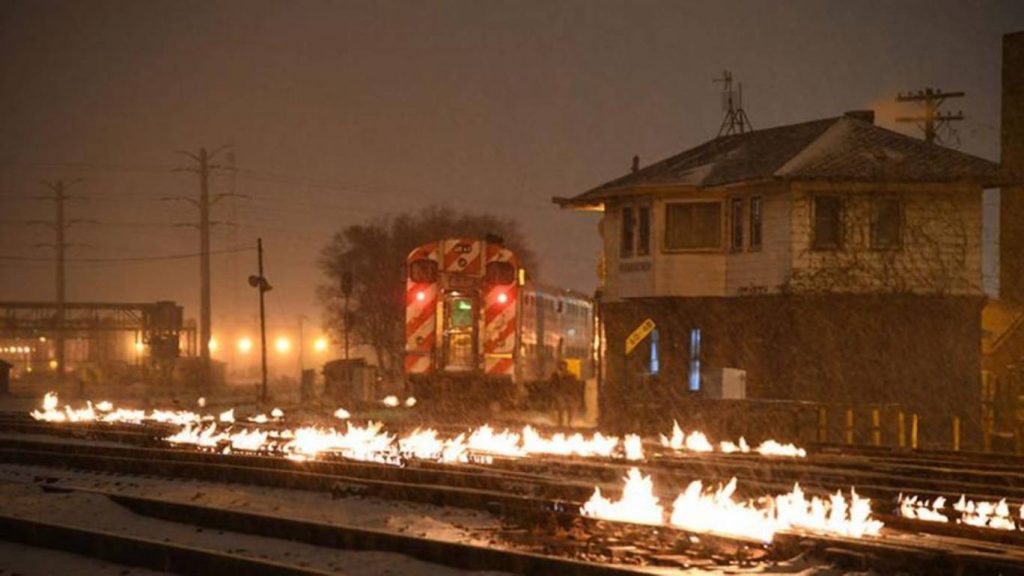 Train tracks set on fire to keep the railway system alive in Chicago