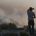 Residents near wildfire in California battle hazardous air