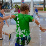 Splash Pads Open at 95th St. Community Plaza and Wolf’s Crossing Community Park