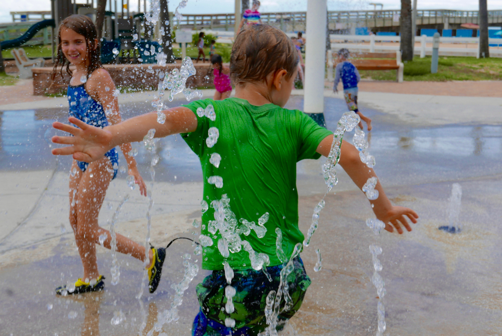 Splash Pads Open at 95th St. Community Plaza and Wolf’s Crossing Community Park